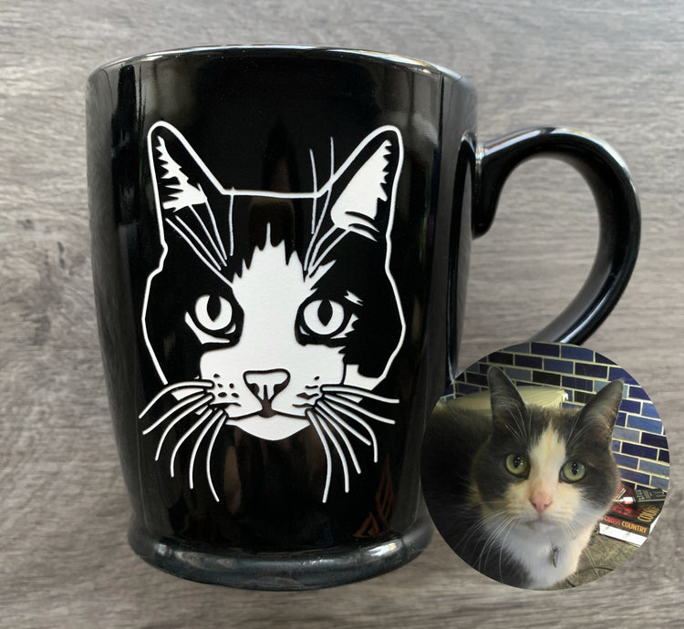 Cat portrait etched onto a black mug with an inset of the original photo it's based on. Art by Amanda Siska of Bread and Badger