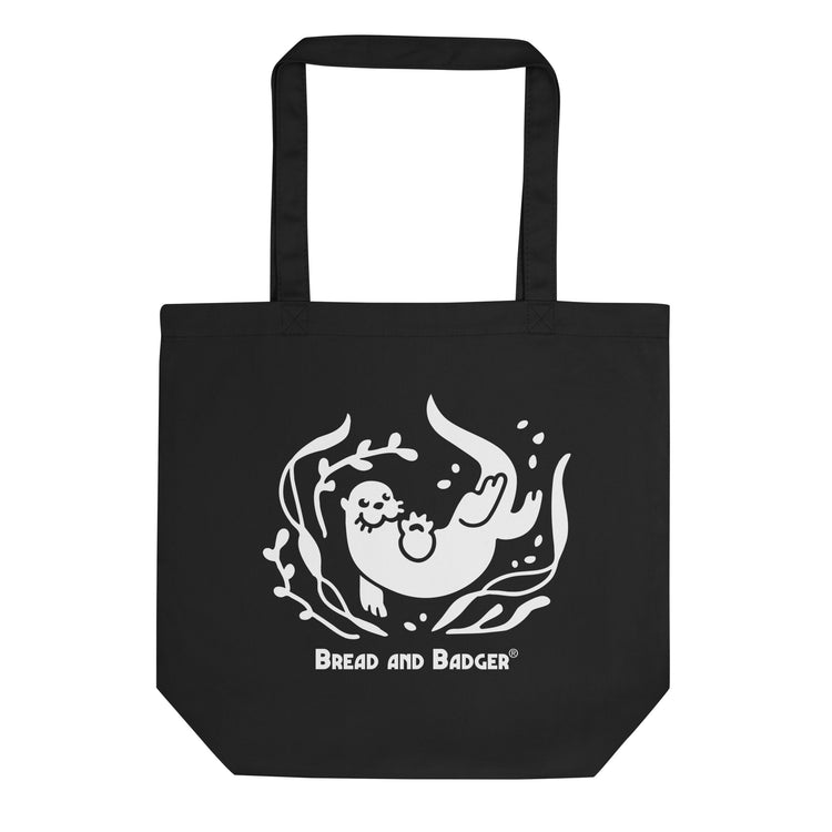 Black tote bag with a white otter and 'Bread and Badger' text on a white background