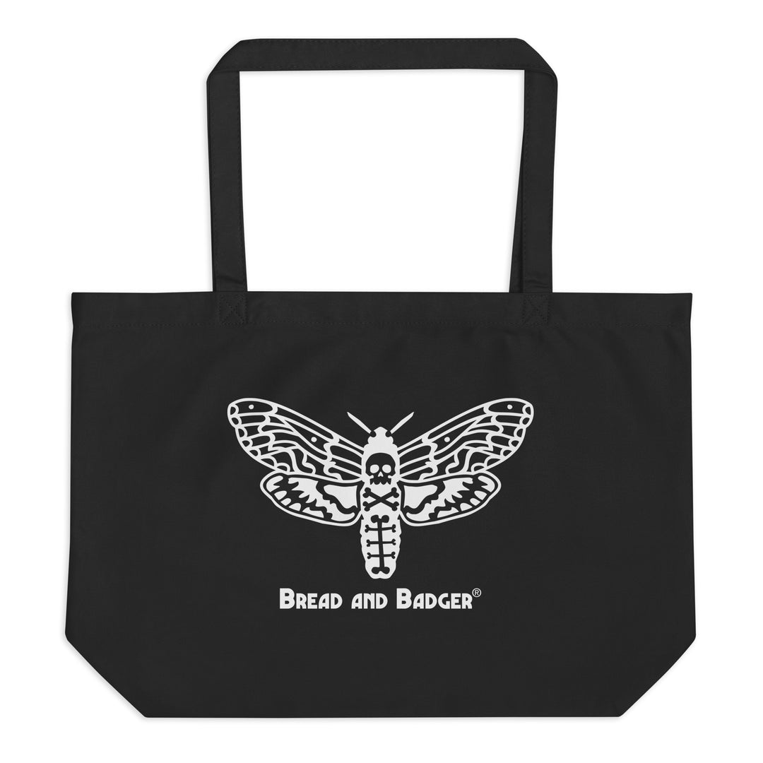Black tote bag with a white moth design and 'Bread and Badger' text on a white background