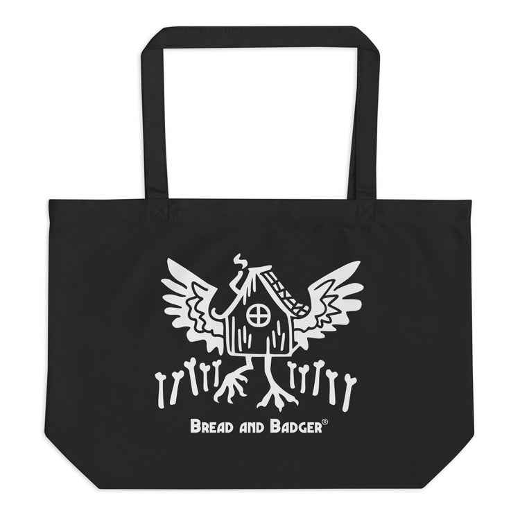 Black tote bag with white Baba Yaga's hut graphic and 'Bread and Badger' text on a white background