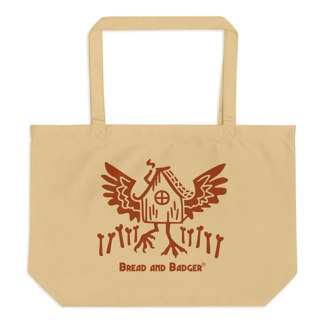 Beige tote bag with red Baba Yaga's hut graphic and 'Bread and Badger' text on a white background