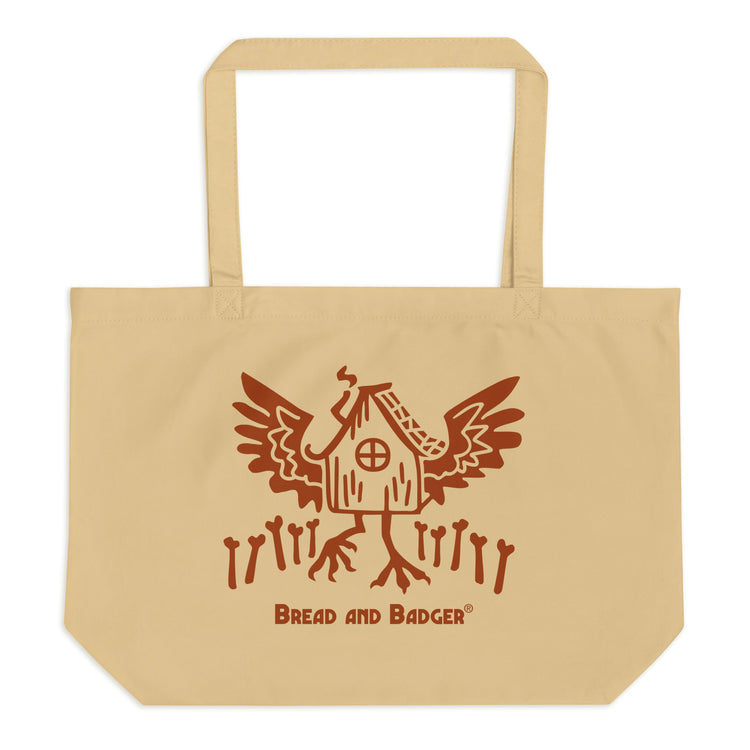 Beige tote bag with red Baba Yaga's hut graphic and 'Bread and Badger' text on a white background