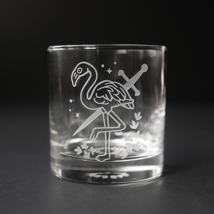 lowball glass etched with a flamingo and sword