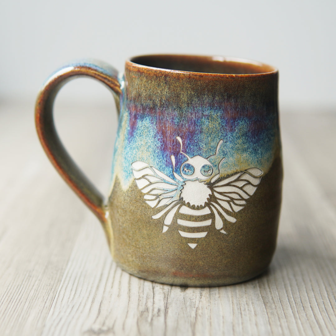 handmade mug engraved with a honey bee in "Dusk" colorway