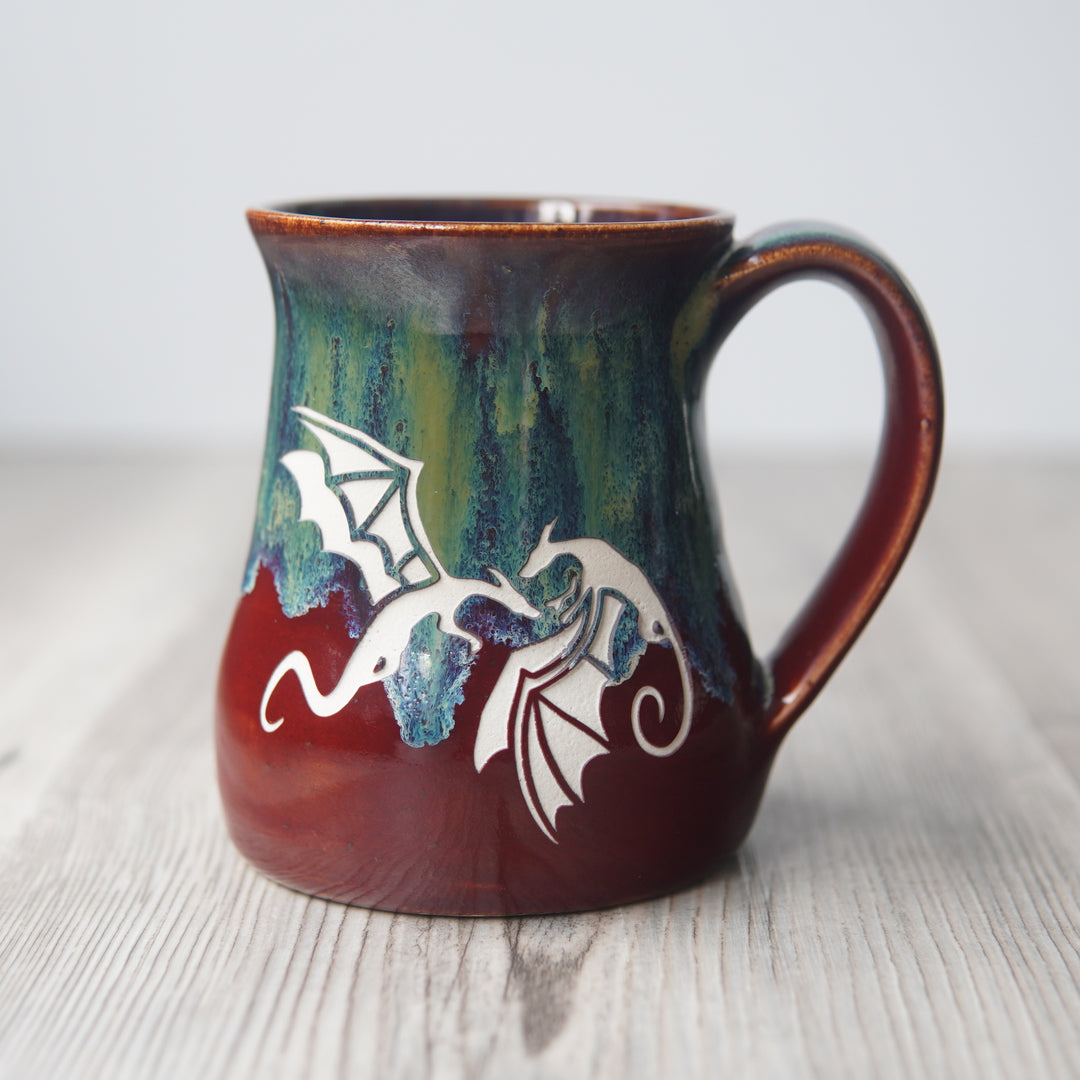 winged dragons engraved on a mug in Fire and Ice colorway