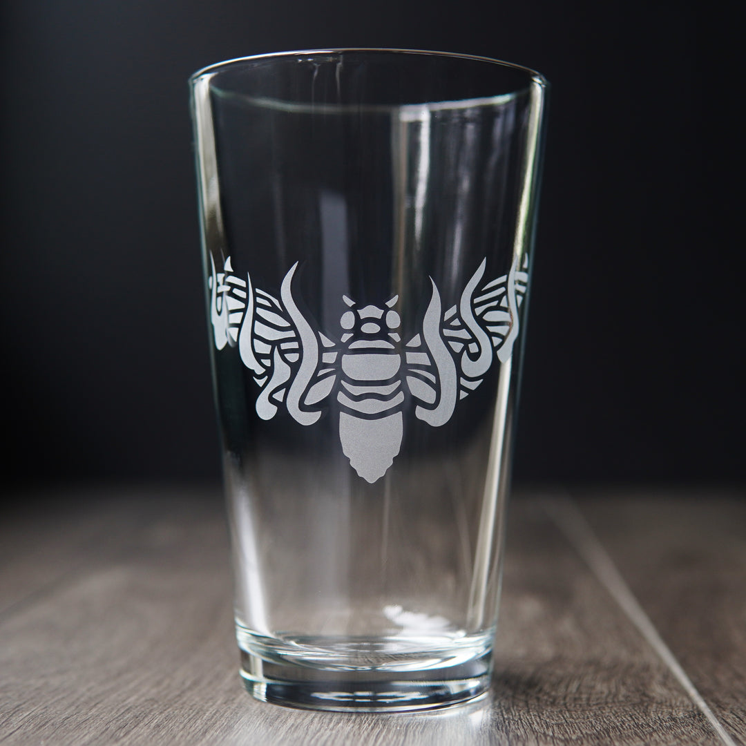 flaming cicada pint glass