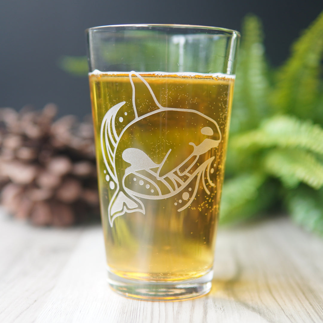 Orca whale and a wave engraved on a pint glass