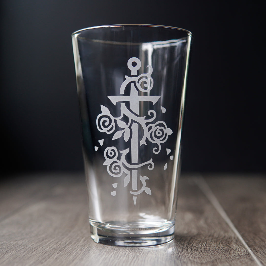 sword and roses pint glass