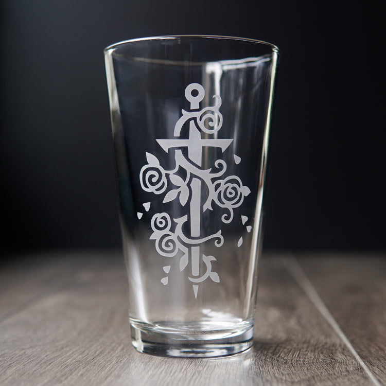 sword and roses pint glass