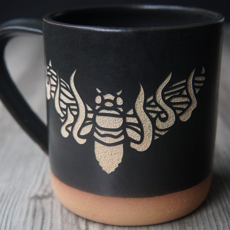 black flaming cicada mug