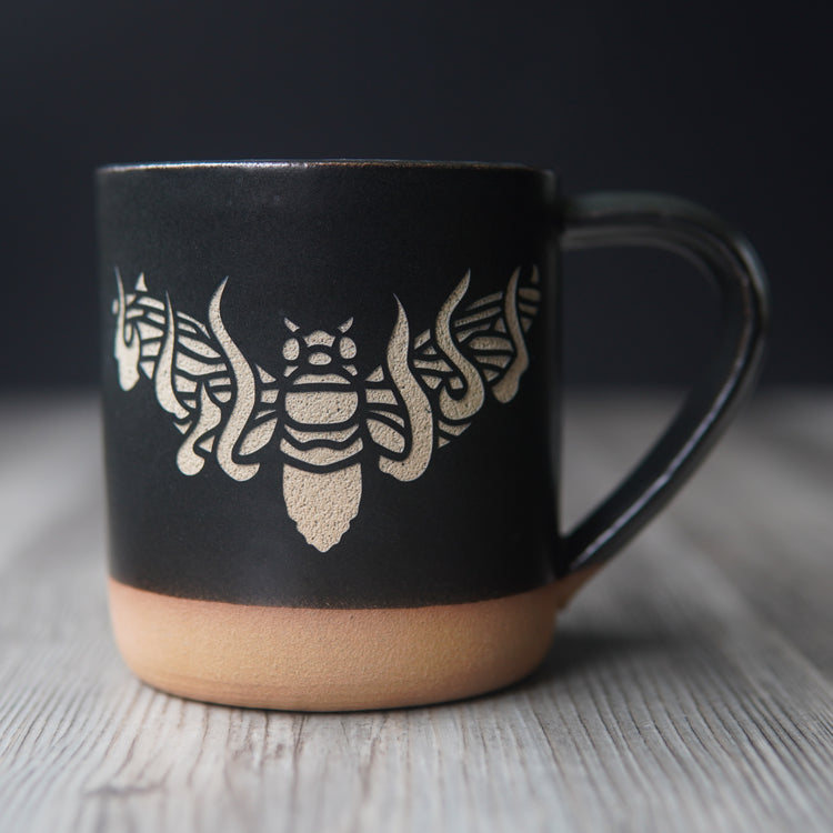 black cicada on fire mug
