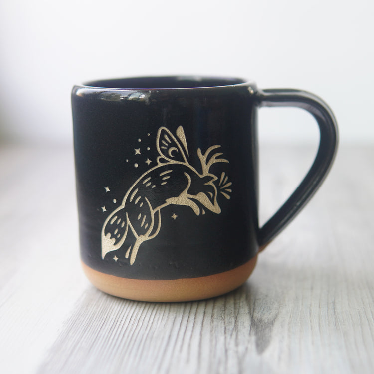 Fox Fairy engraved pottery mug in black glaze