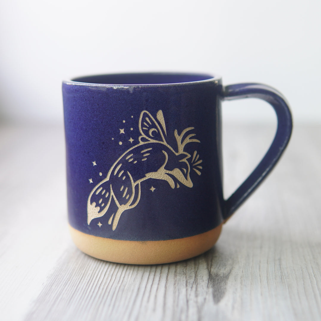 Fox Fairy engraved pottery mug in cobalt blue glaze