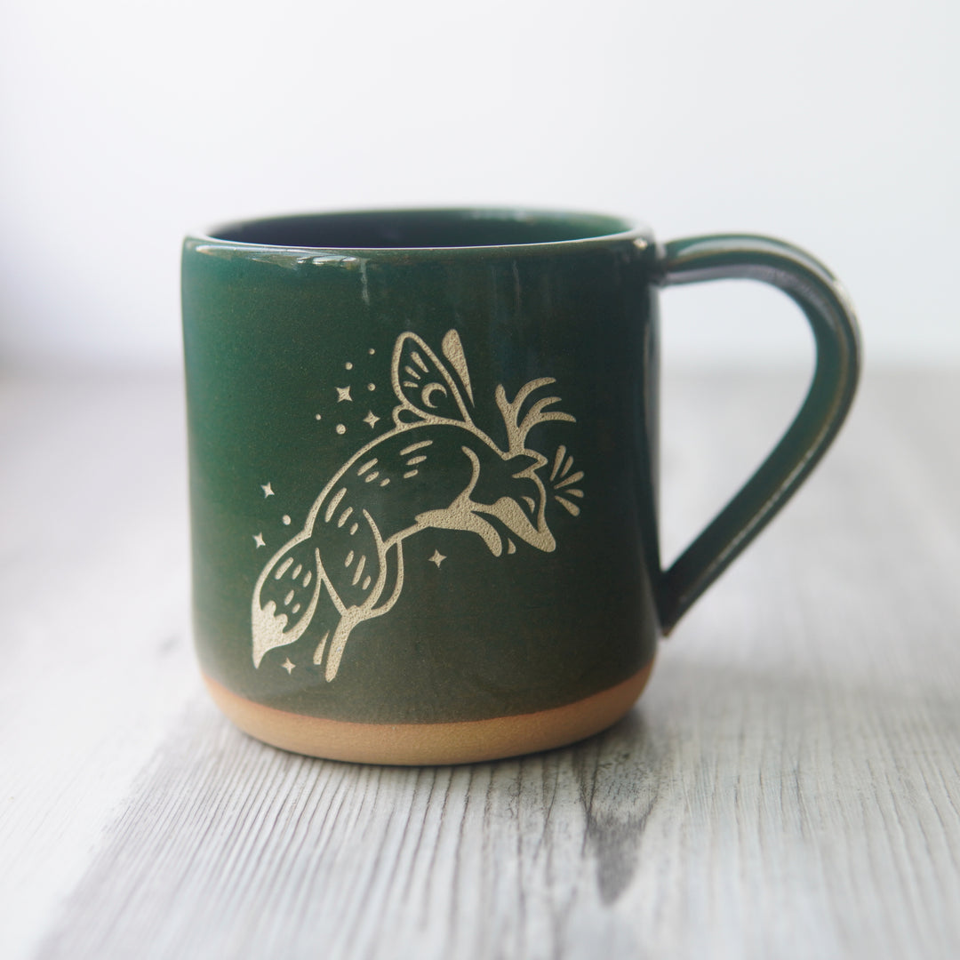 Fox Fairy engraved pottery mug in pine green glaze