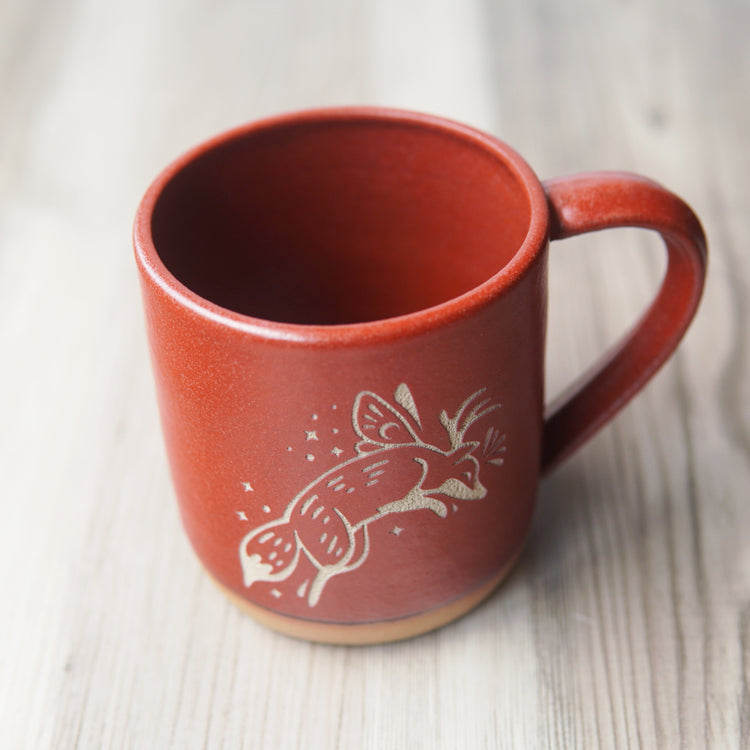 Fox Fairy engraved pottery mug in paprika red glaze