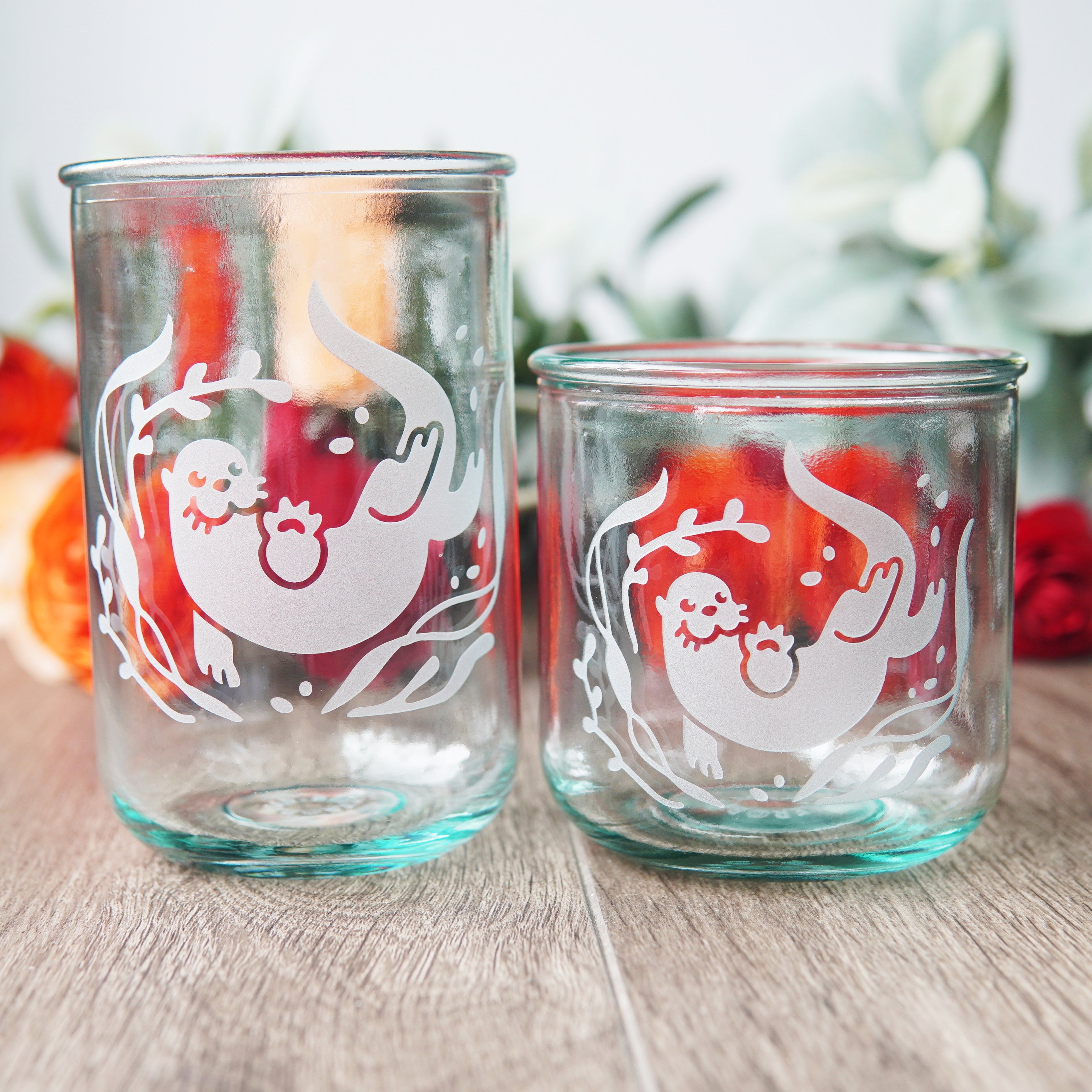 Tall and short otter glassware with flowers