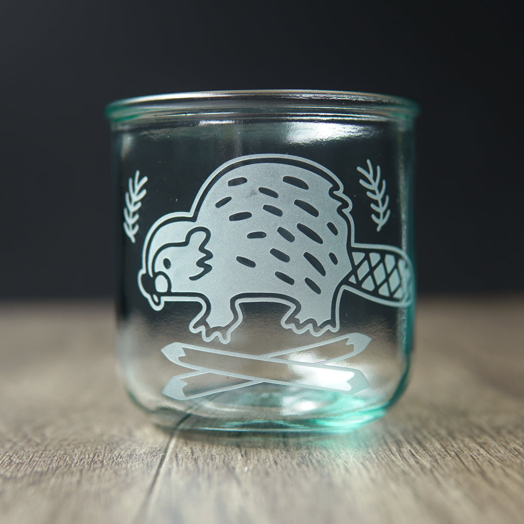 short recycled glass cup engraved with a cute beaver and crossed logs
