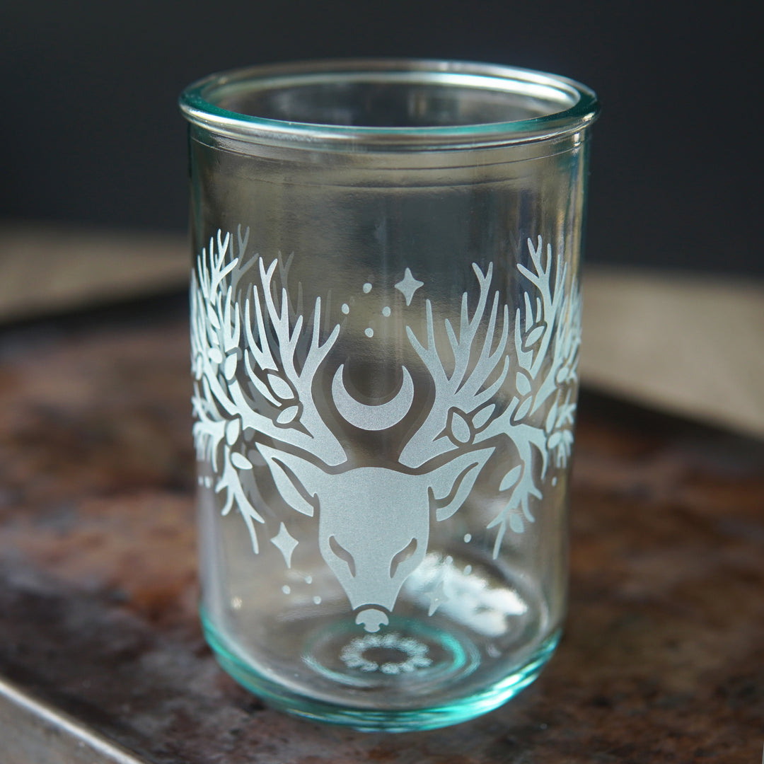 recycled glass cup engraved with a deer head with tree branches for antlers