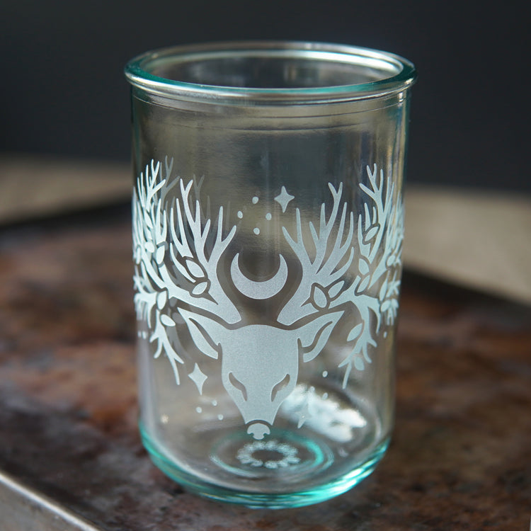 recycled glass cup engraved with a deer head with tree branches for antlers