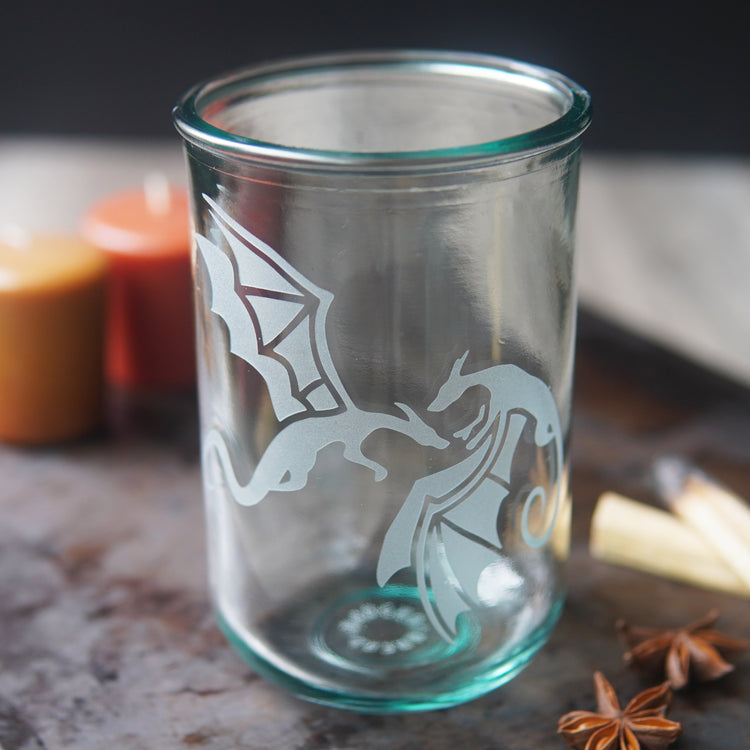 winged dragons engraved on a tall glass