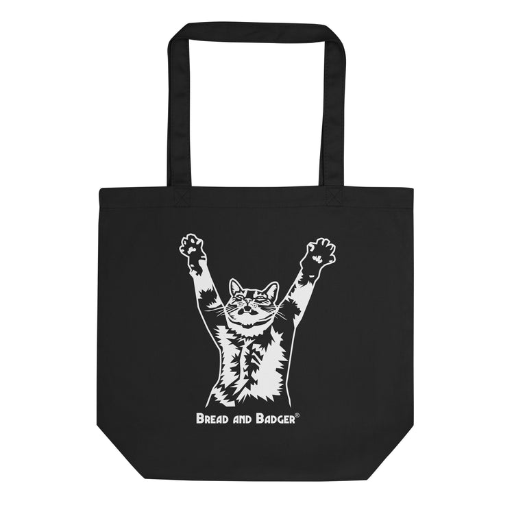 Black tote bag with a white graphic of a cat and 'Bread and Badger' text on a white background
