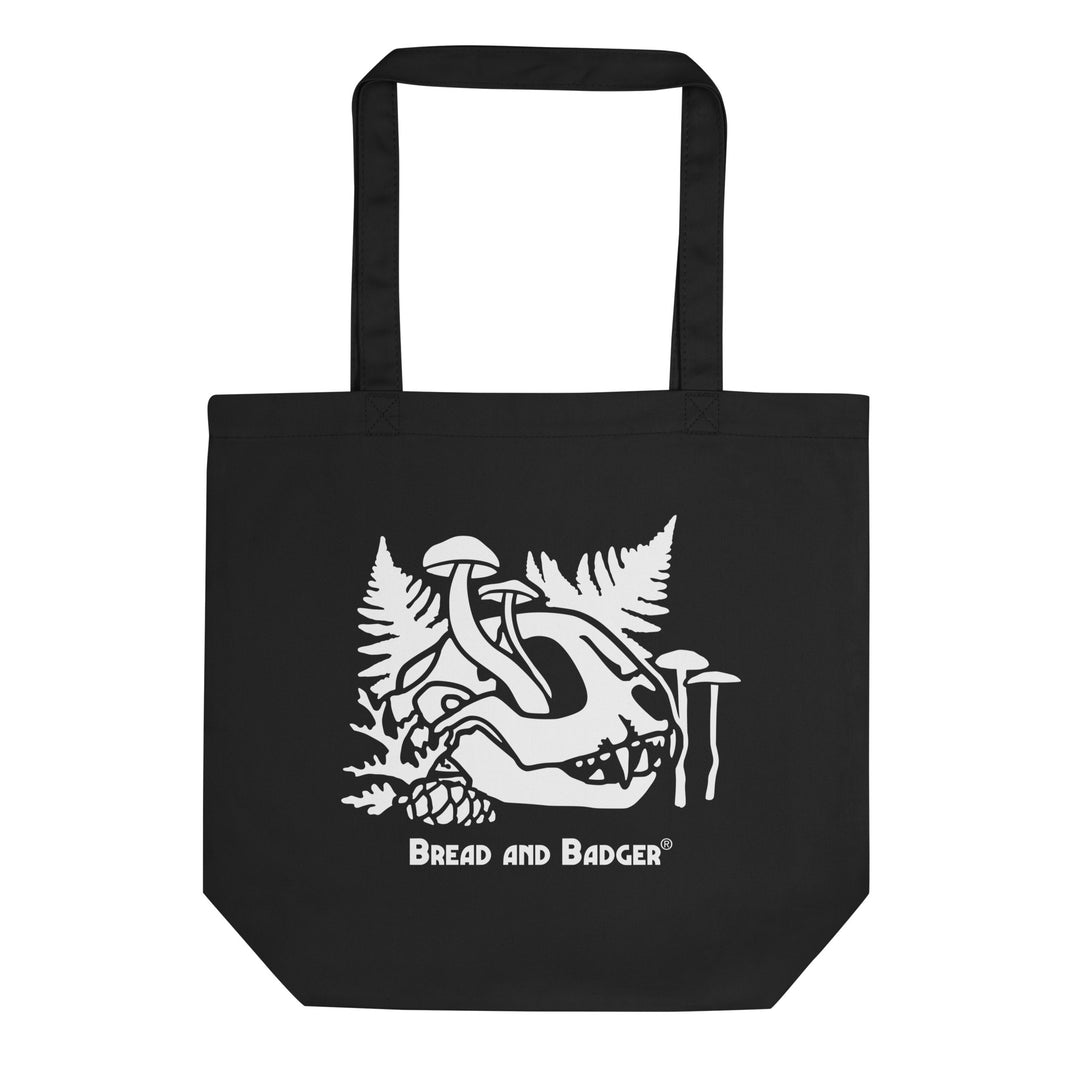 Black tote bag with white cat skull graphic design and 'Bread and Badger' text on a white background
