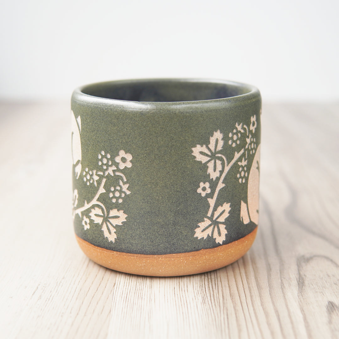 Rabbit Mug in Moss green, seen from the side