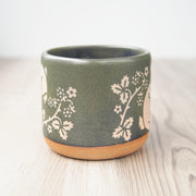 Rabbit Mug in Moss green, seen from the side