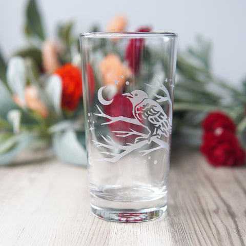 highball glass engraved with a crow on branches and crescent moon