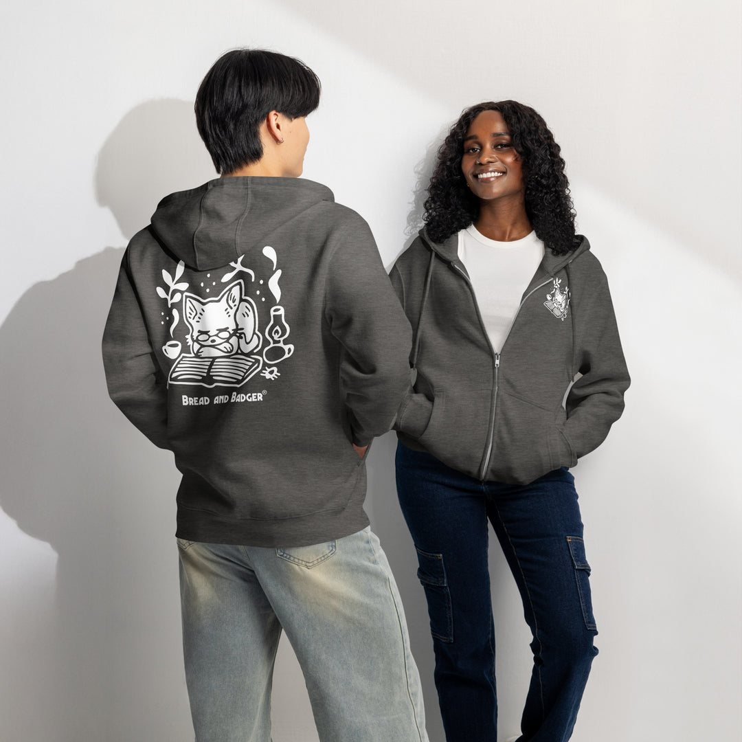 Two people wearing charcoal heather hoodies with white graphics on a plain background