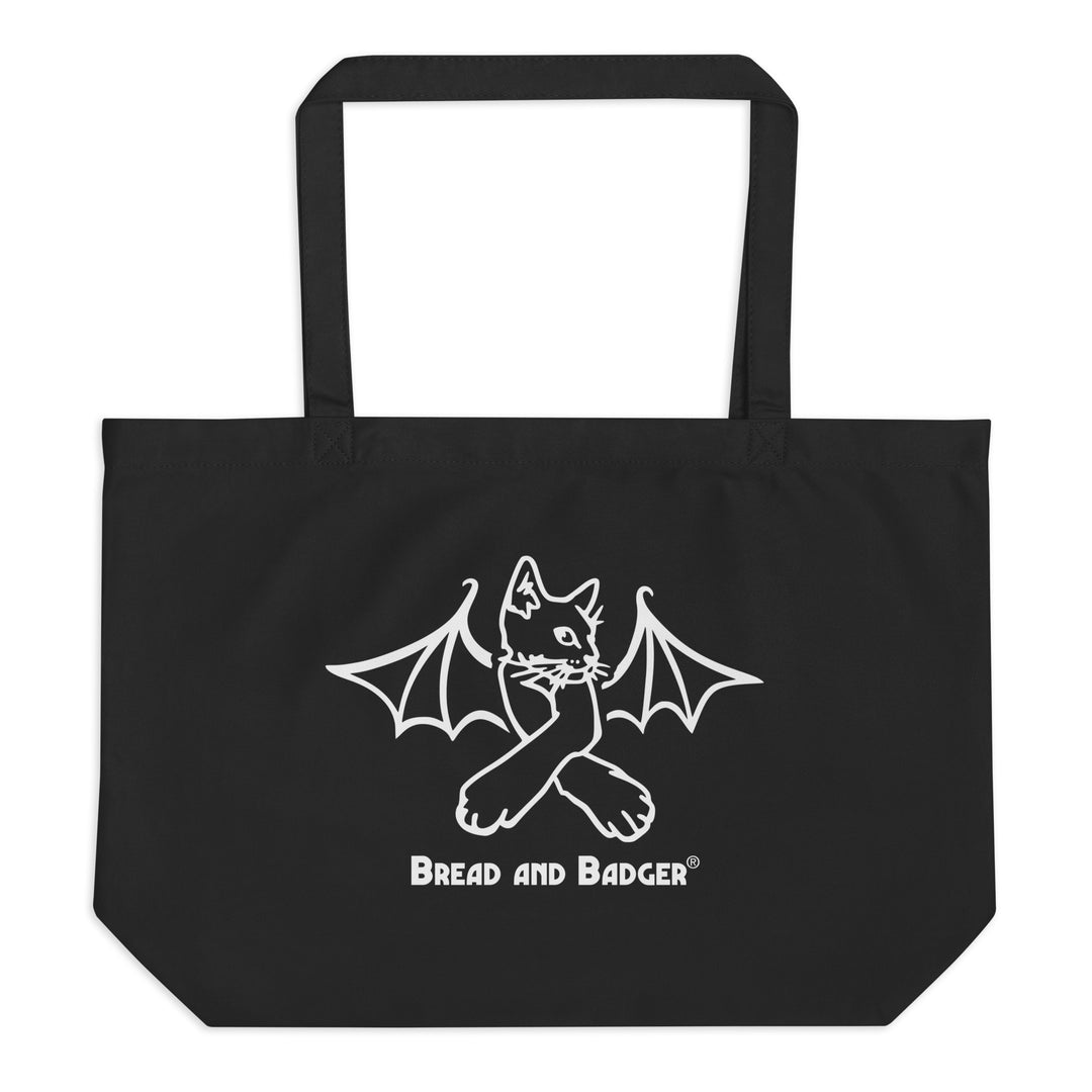 Black tote bag with a white bat cat design and 'Bread and Badger' text on a white background