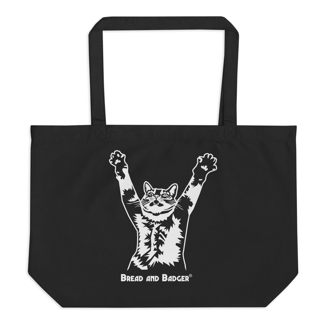 Black tote bag with a white cat graphic and 'Bread and Badger' text on a white background