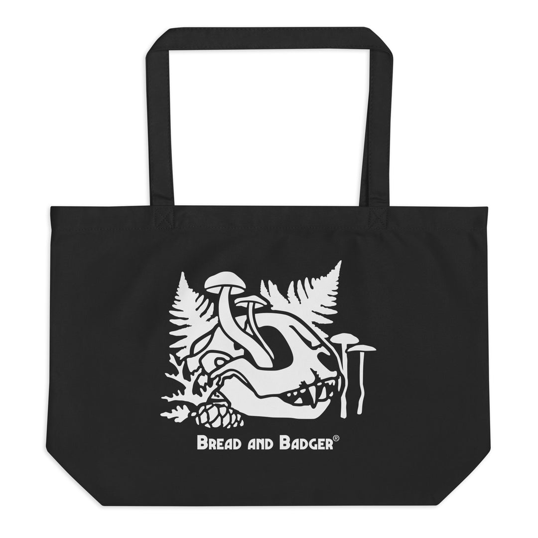 Black tote bag with white cat skull graphic and 'Bread and Badger' text on a white background