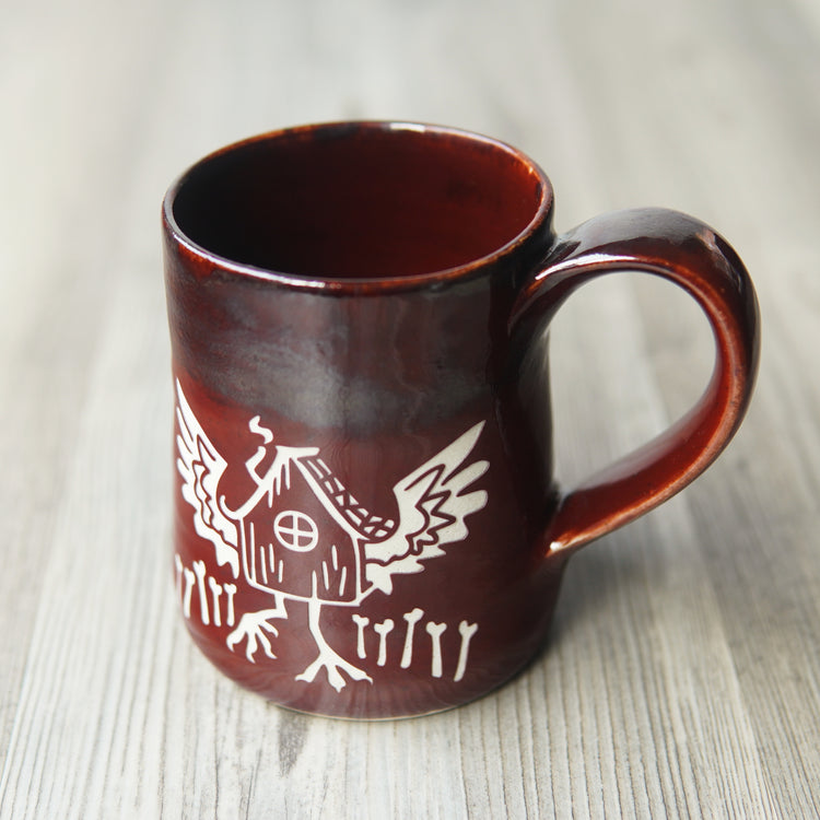 Baba Yaga's hut mug with "Magma" red glaze