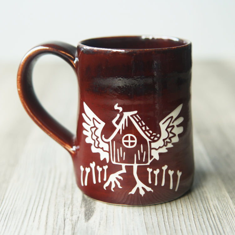 Baba Yaga's hut mug with "Magma" red glaze