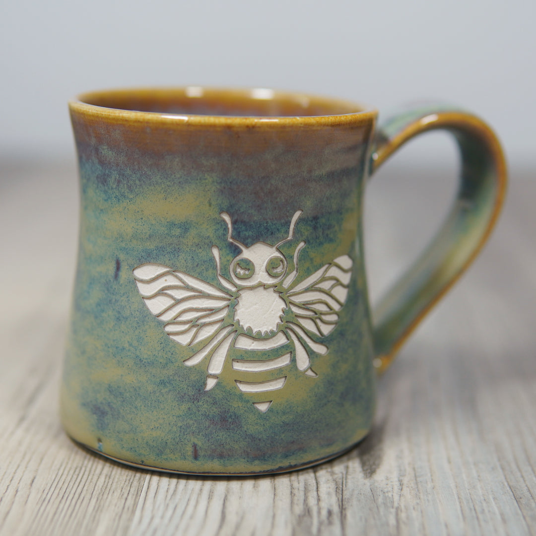 handmade mug engraved with a honey bee