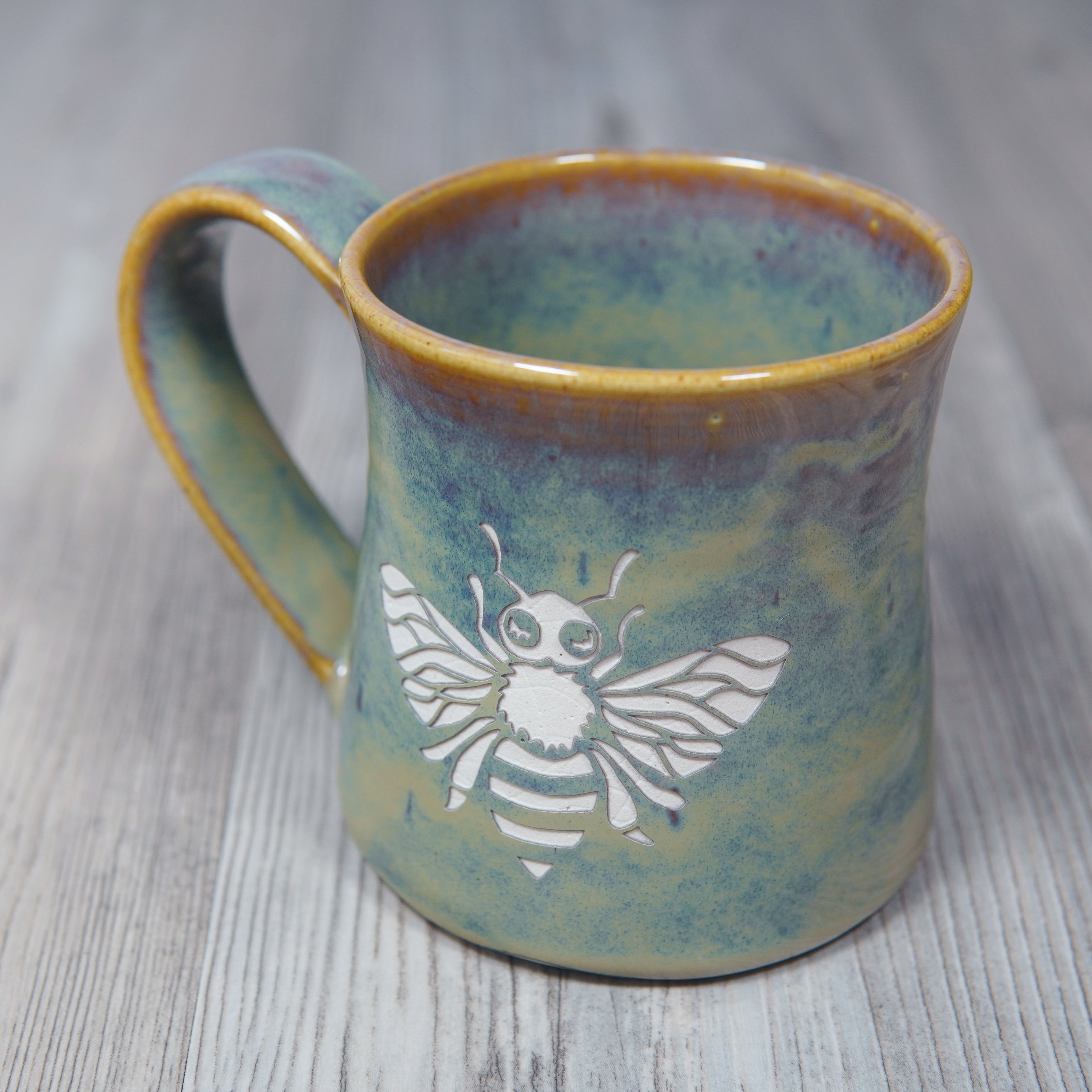 handmade mug engraved with a honey bee