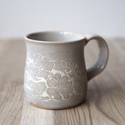 dogwood flower engraved onto a handmade mug