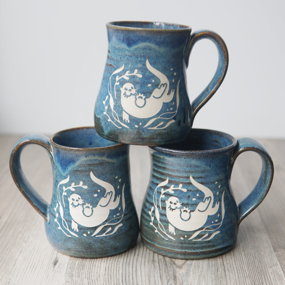 3 otter mugs in "kelp" colorway