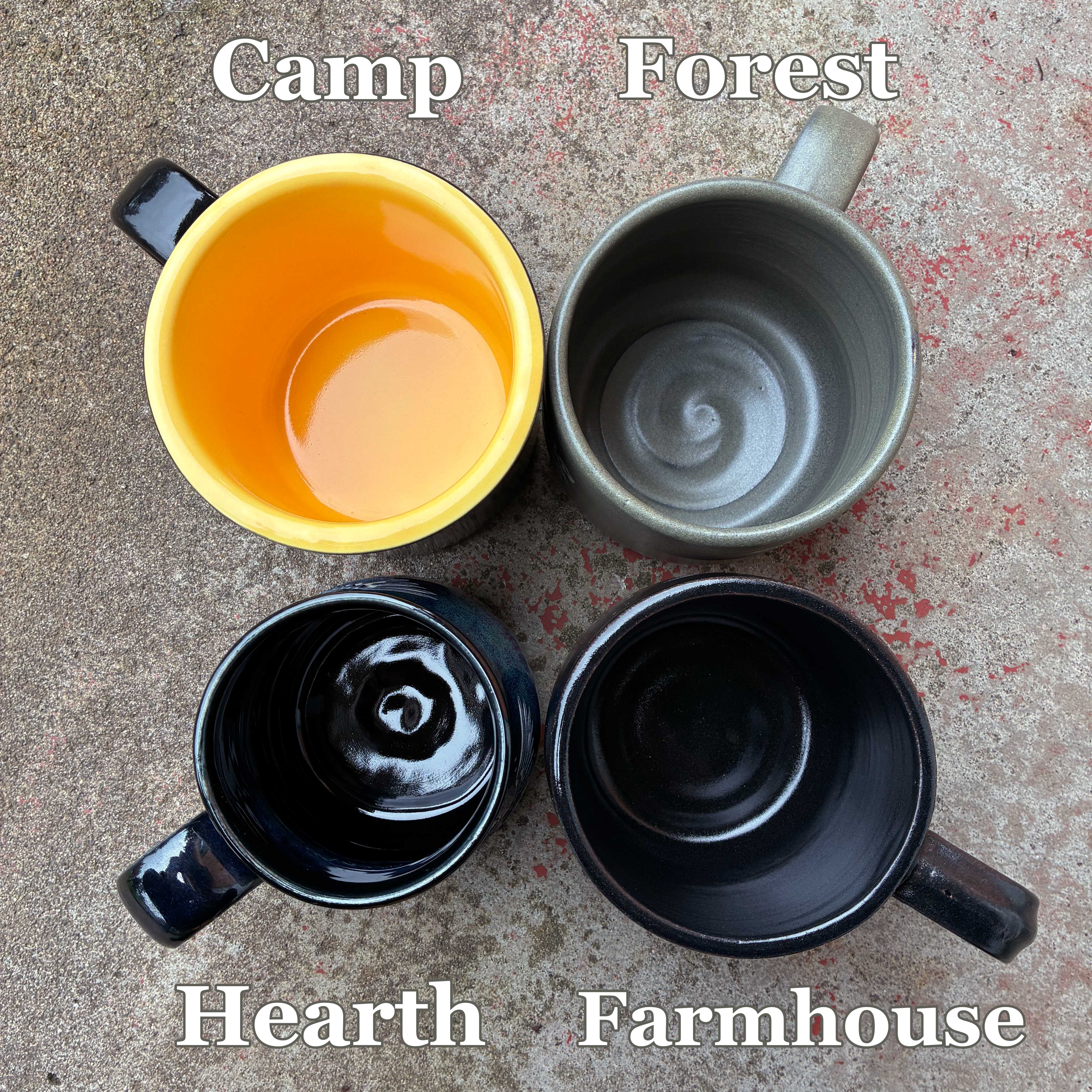 Four mugs seen from above labeled 'Camp', 'Forest', 'Hearth', and 'Farmhouse' on a textured surface.
