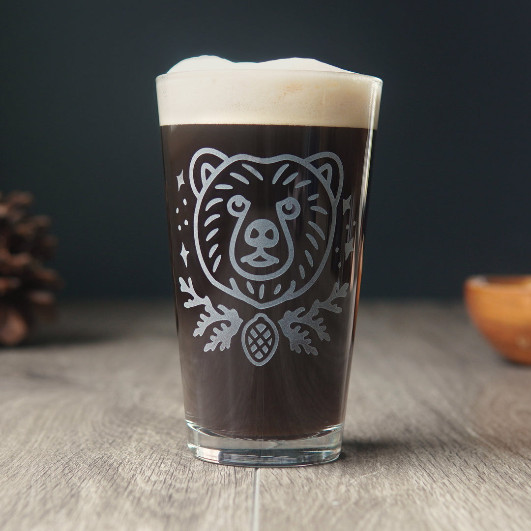 Bear pint glass full of dark beer