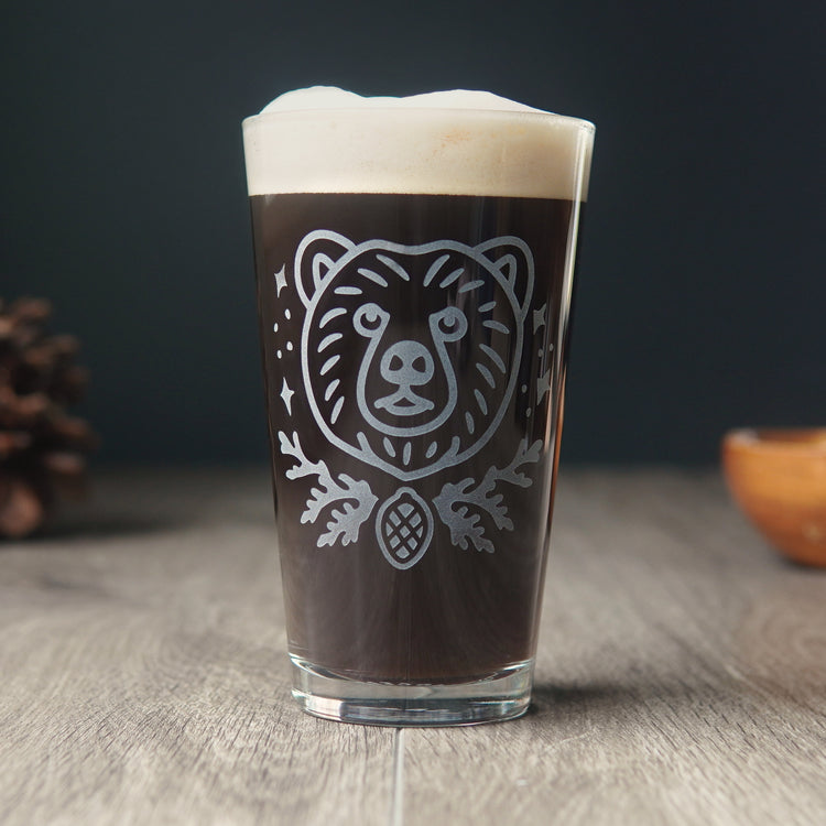 Bear pint glass full of dark beer