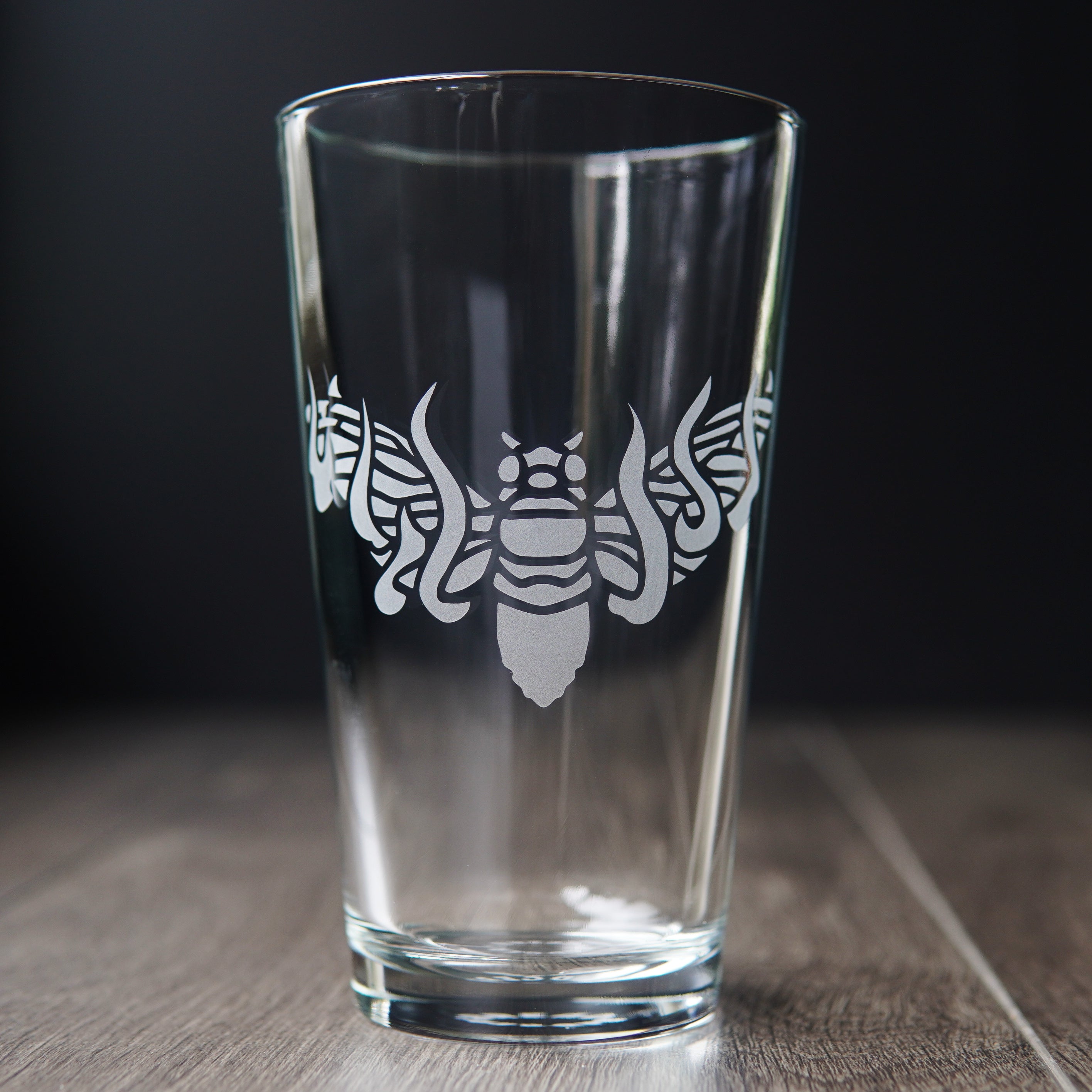 flaming cicada pint glass