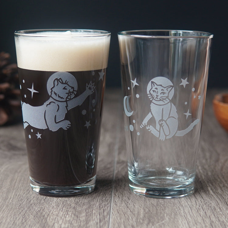 pair of pint glasses engraved with space cats