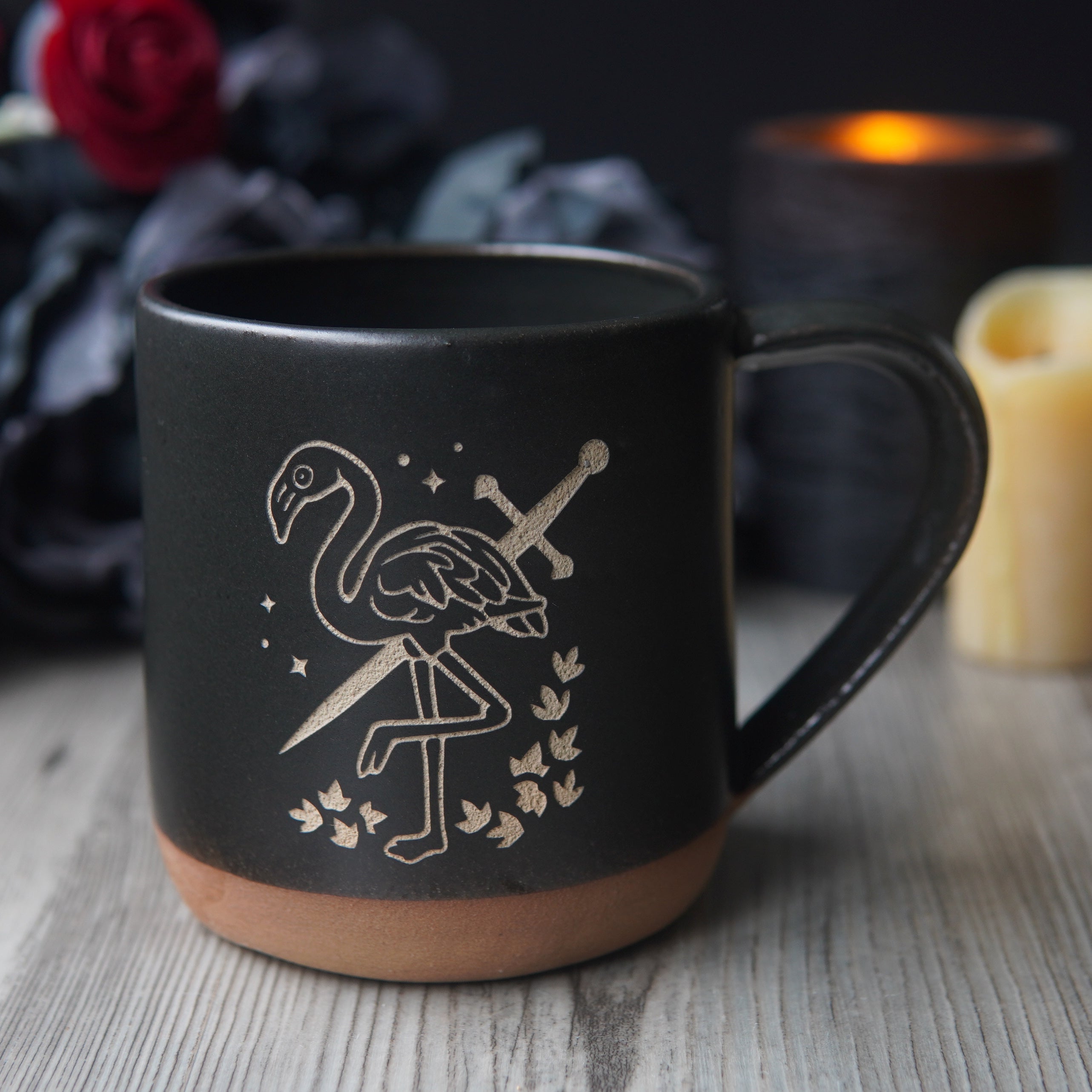 black flamingo with a sword mug