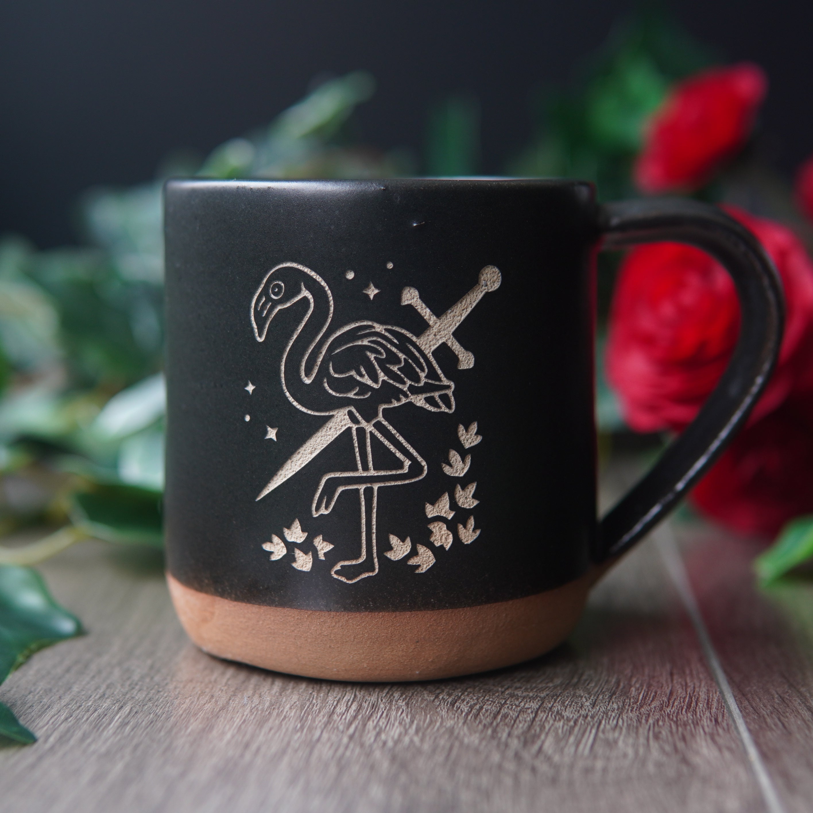 black flamingo with a sword mug