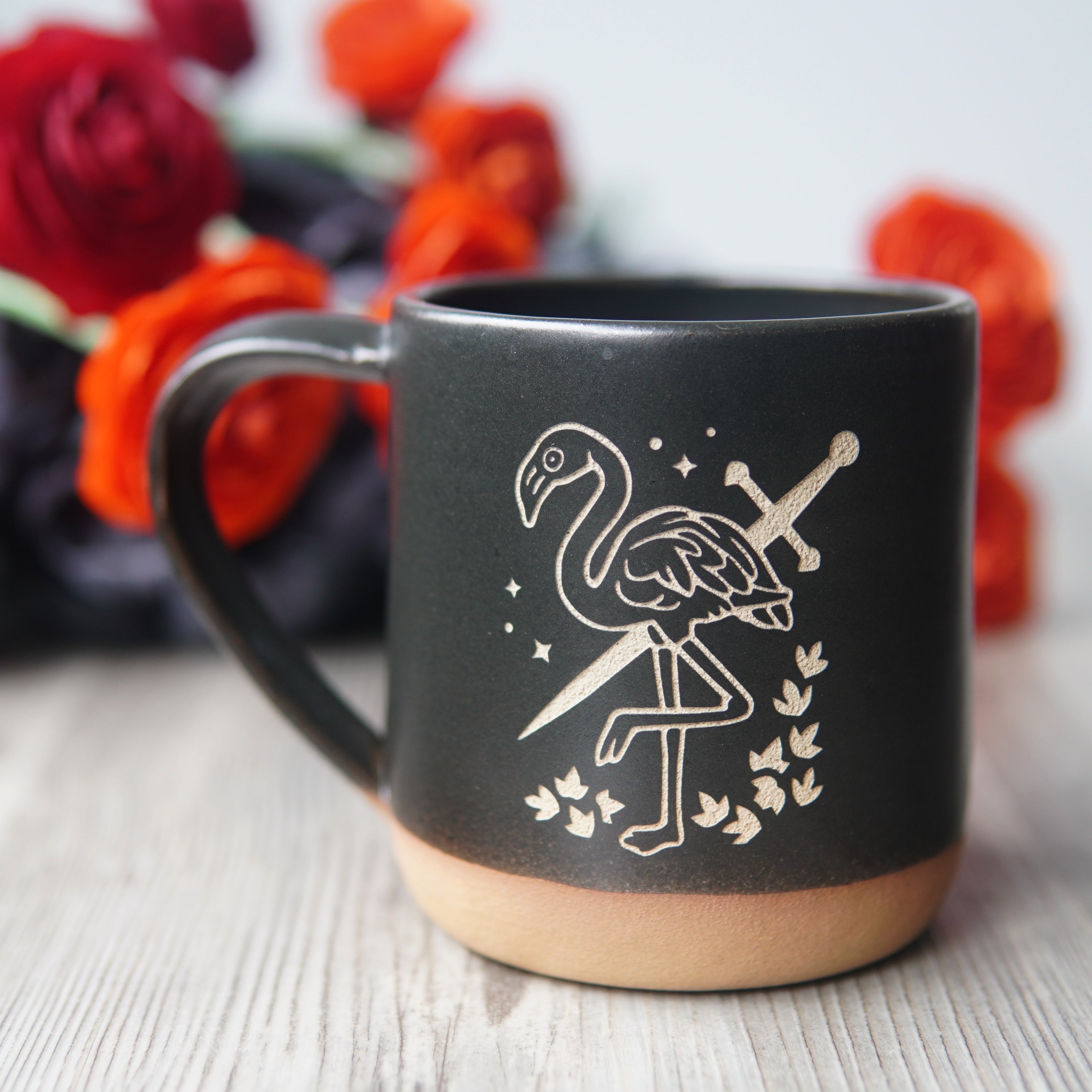 black flamingo with a sword mug