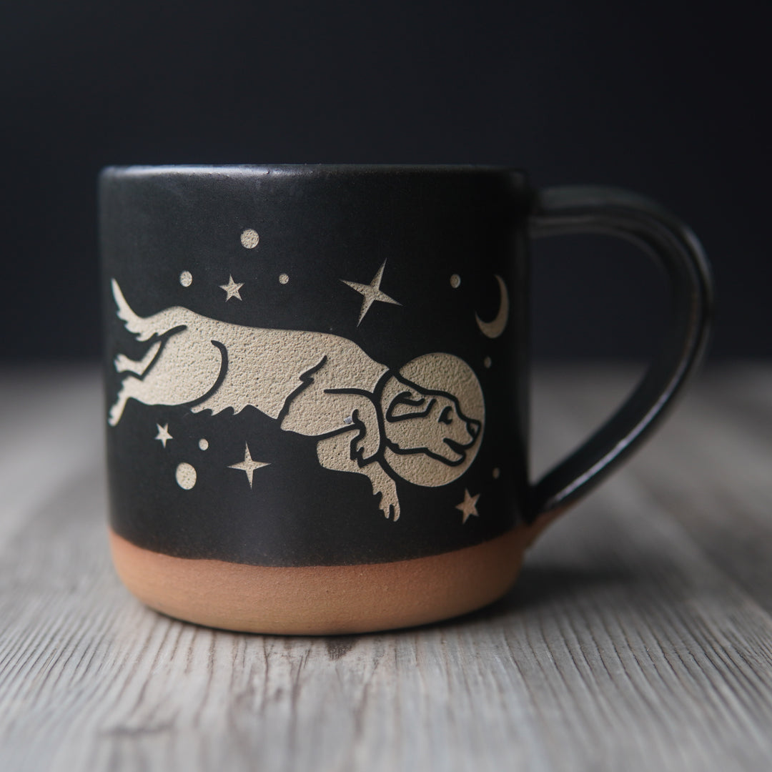 black space dog mug