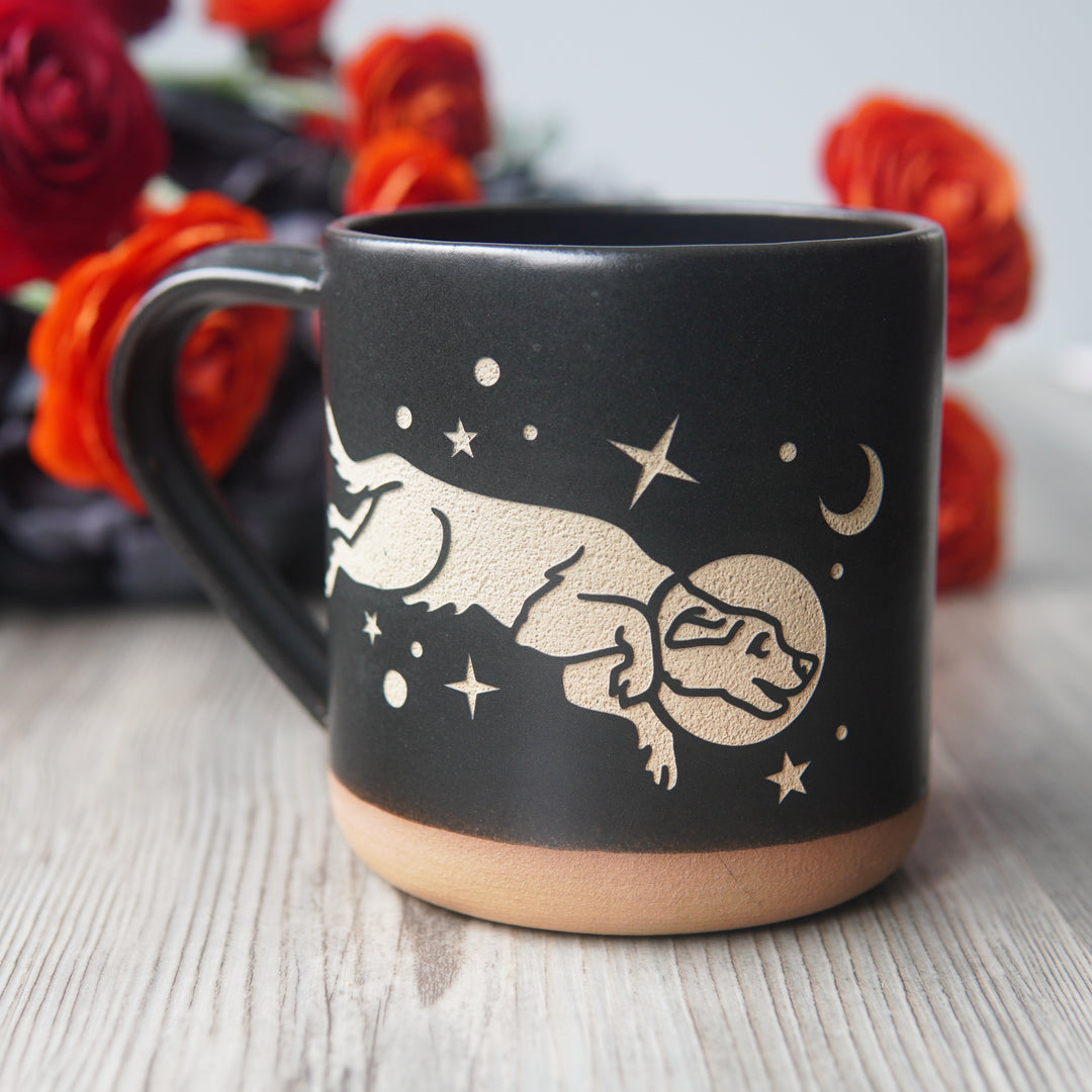 black space dog mug