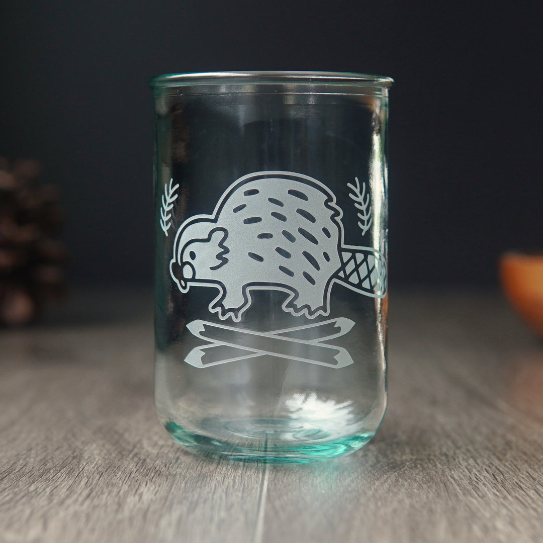 Beaver etched on a tall recycled glass cup